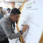 Kapolda Aceh Menandatangani deklarasi Green Policing tolak tambang ilegal di Aceh. (Foto:Dok/Humas Polda)