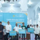 Penyaluran sembako BSI Aceh untuk yatim dan dhuafa. (Foto: Arsip BSI Aceh)