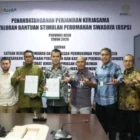 Penandatanganan kerja sama penyaluran BSPS 2026 antara Bank Aceh dan BP2P Sumatera I. (Foto:Dok Bank Aceh).