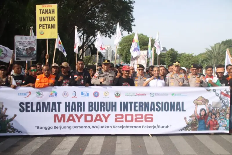 Aksi buruh dan Pengamanan polisi pada peringatan Mau Day di Banda Aceh. (Foto:Dok/Ist)