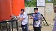 Peresmian sumur bor PT solusi bangun Indonesia