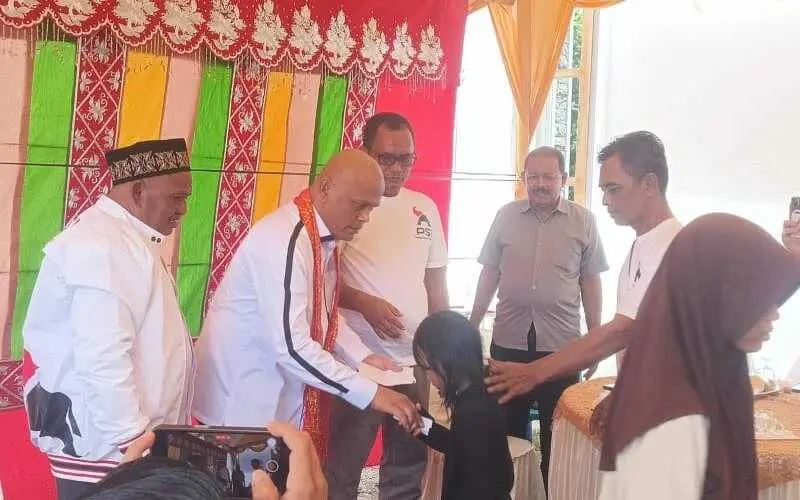 Santunan anak yatim dalam agenda roadshow PSI Aceh.(Foto:Dok/PSI)